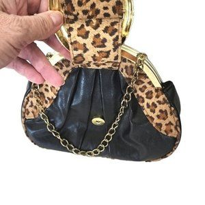 Unique bag leopard patterned tall clutch with snake ornament from Funk Me